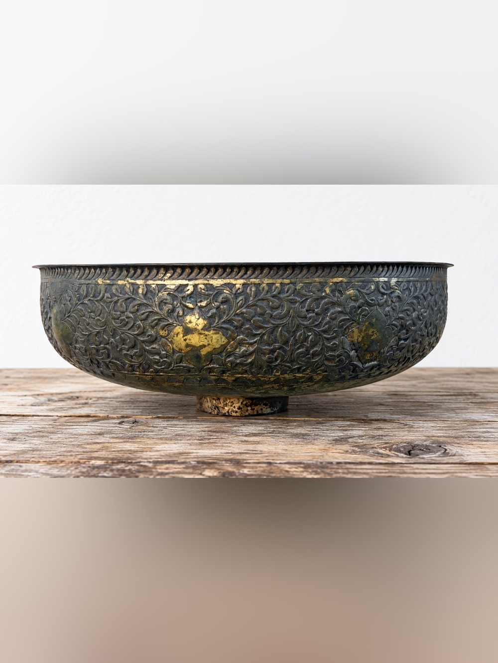 Ornate Brass-Tone Footed Bowl with Floral Relief & Aged Patina